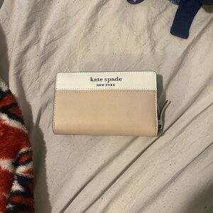 Kate Spade wallet - has 2 visible stains
